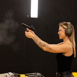Female shooting a Glock pistol